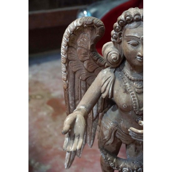 Antique wooden guardian angel